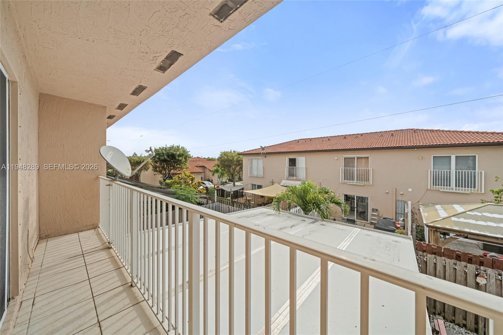 13770 Southwest 170th Lane Miami, FL 33177 - Photo 20 of 24 a view of a street from a balcony
