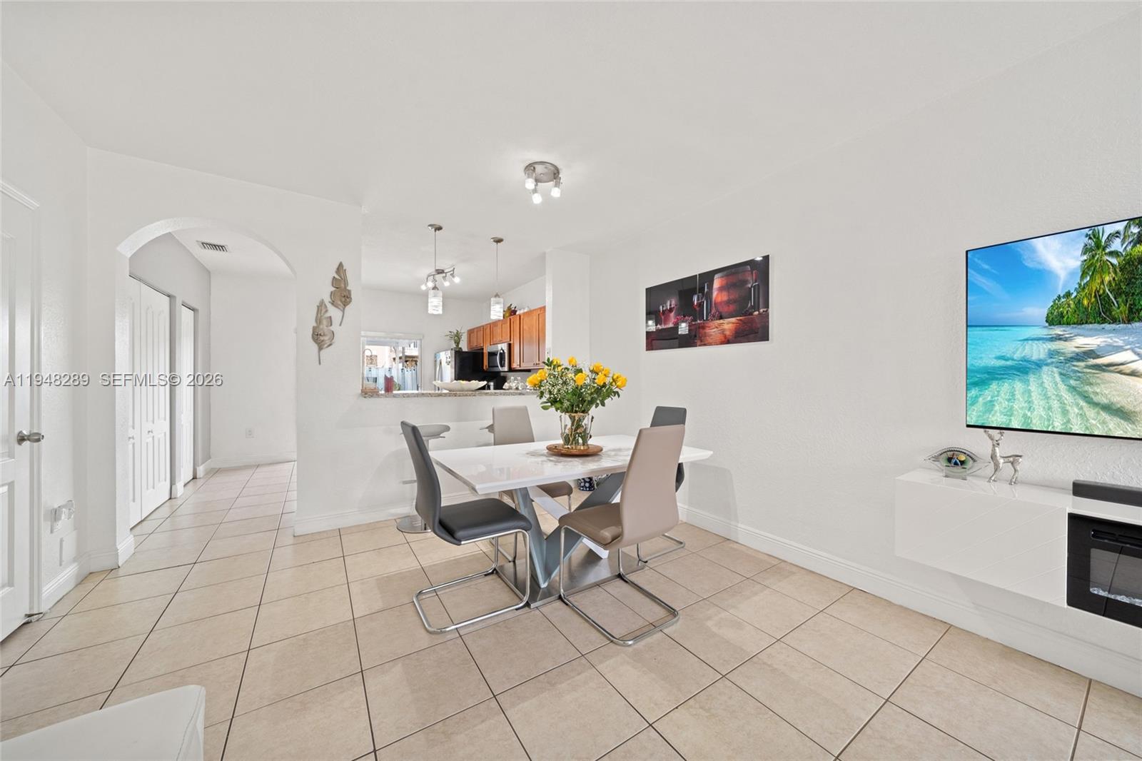13770 Southwest 170th Lane Miami, FL 33177 - Photo 6 of 24 a dining room with furniture and window