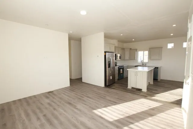 a view of a kitchen with a sink