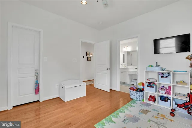 a room with furniture and a flat screen tv