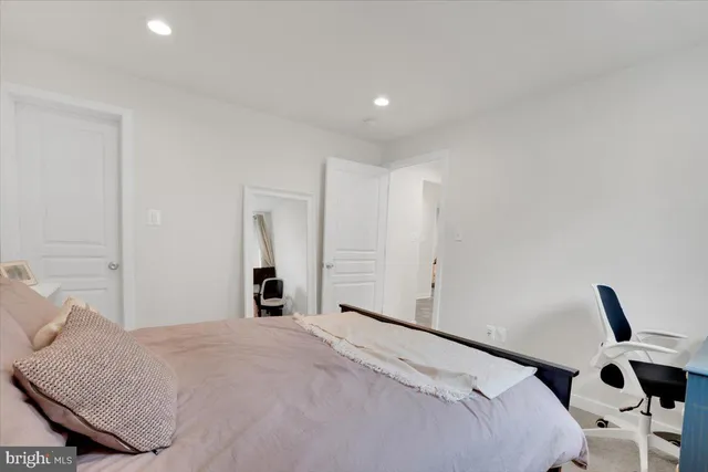 a bathroom with a sink toilet a shower and a mirror