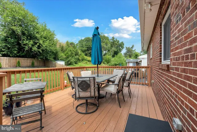 a view of a street with seating space