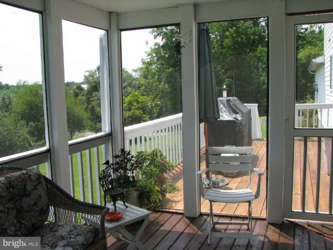 13478 Molly Berry Road Brandywine, MD 20613 - Photo 18 of 26 Screened-in Porch to Deck