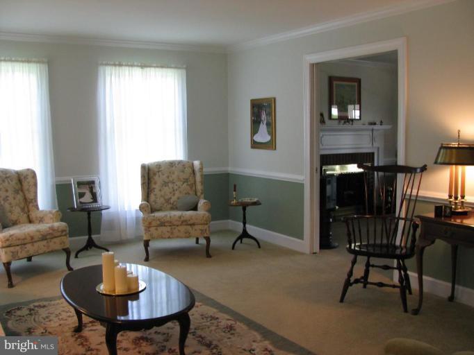 13478 Molly Berry Road Brandywine, MD 20613 - Photo 5 of 26 Living Room viewing Den