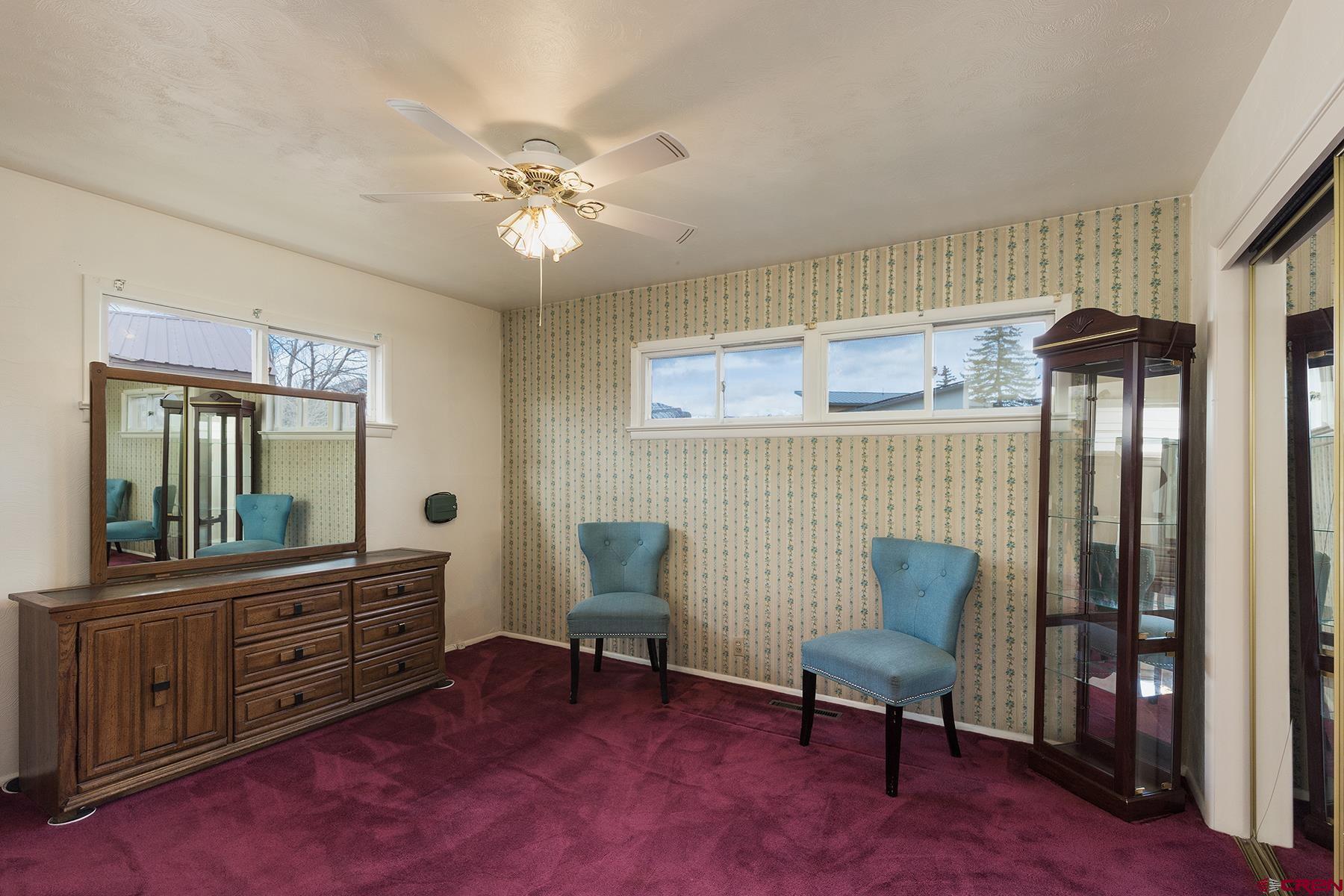 164 Riverview Drive Durango, CO 81301 - Photo 12 of 32 a view of a workspace with furniture and a window
