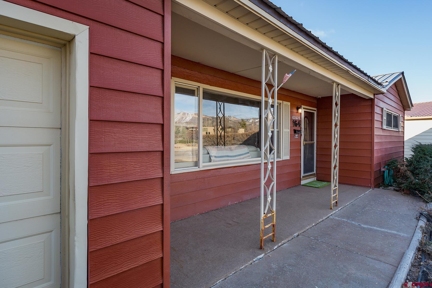 164 Riverview Drive Durango, CO 81301 - Photo 2 of 32 a view of front door of house