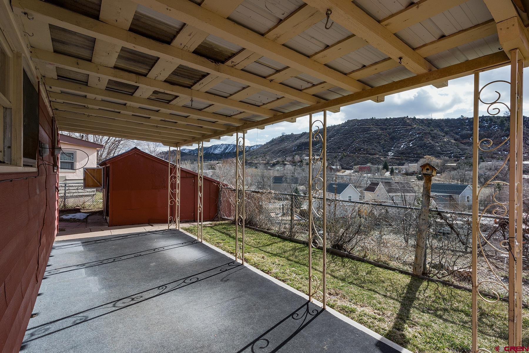 164 Riverview Drive Durango, CO 81301 - Photo 22 of 32 a view of a backyard
