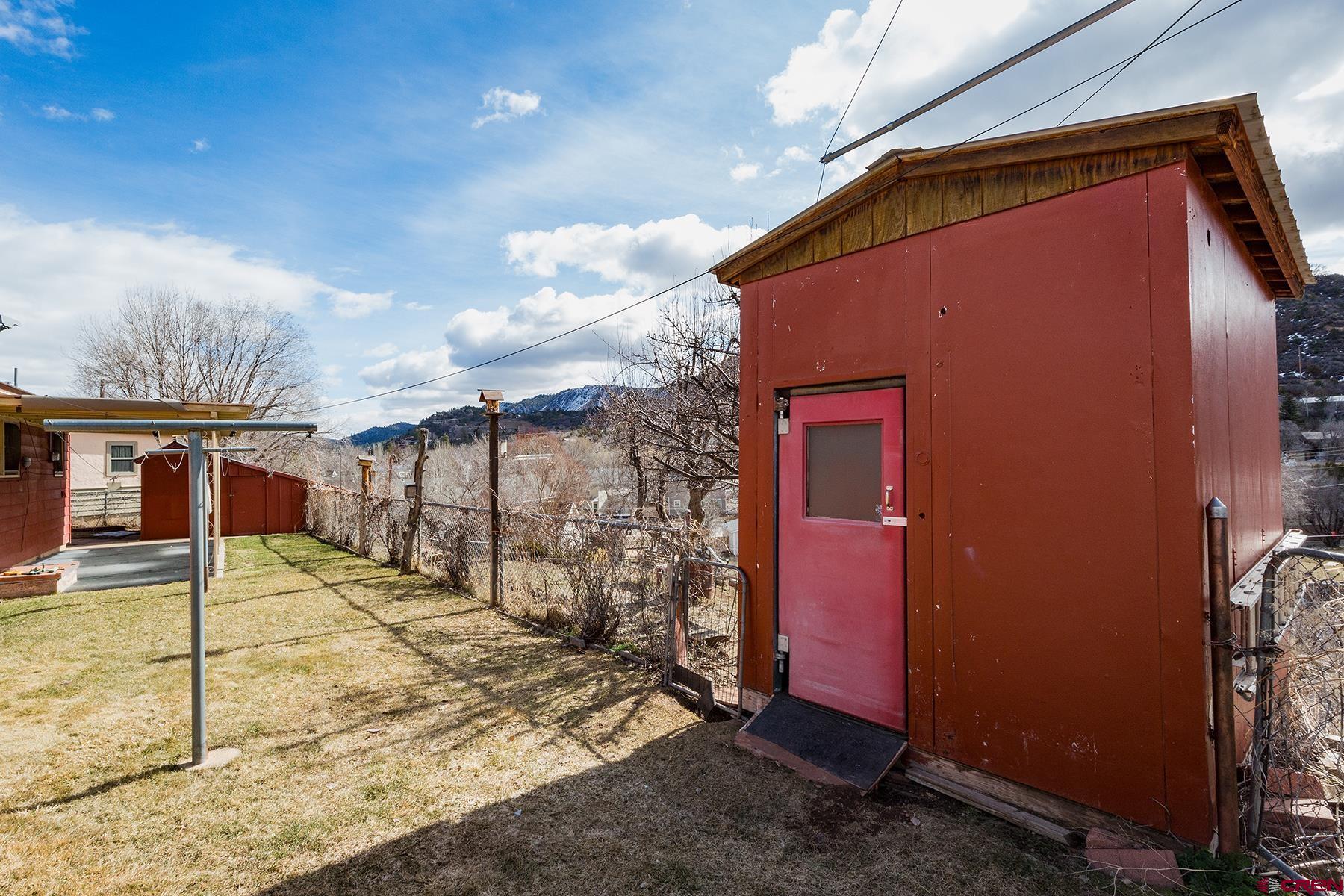 164 Riverview Drive Durango, CO 81301 - Photo 24 of 32 a view of a house with backyard