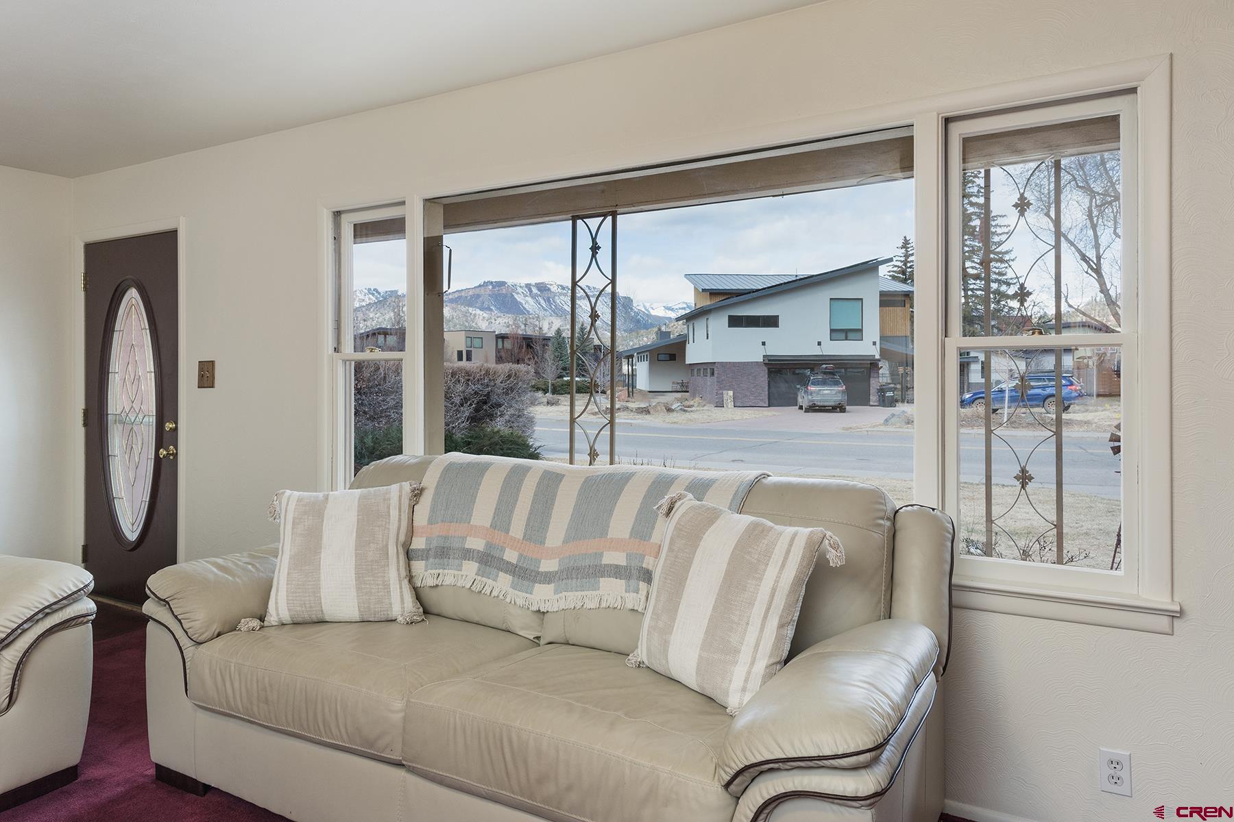 164 Riverview Drive Durango, CO 81301 - Photo 6 of 32 a living room with furniture and a large window