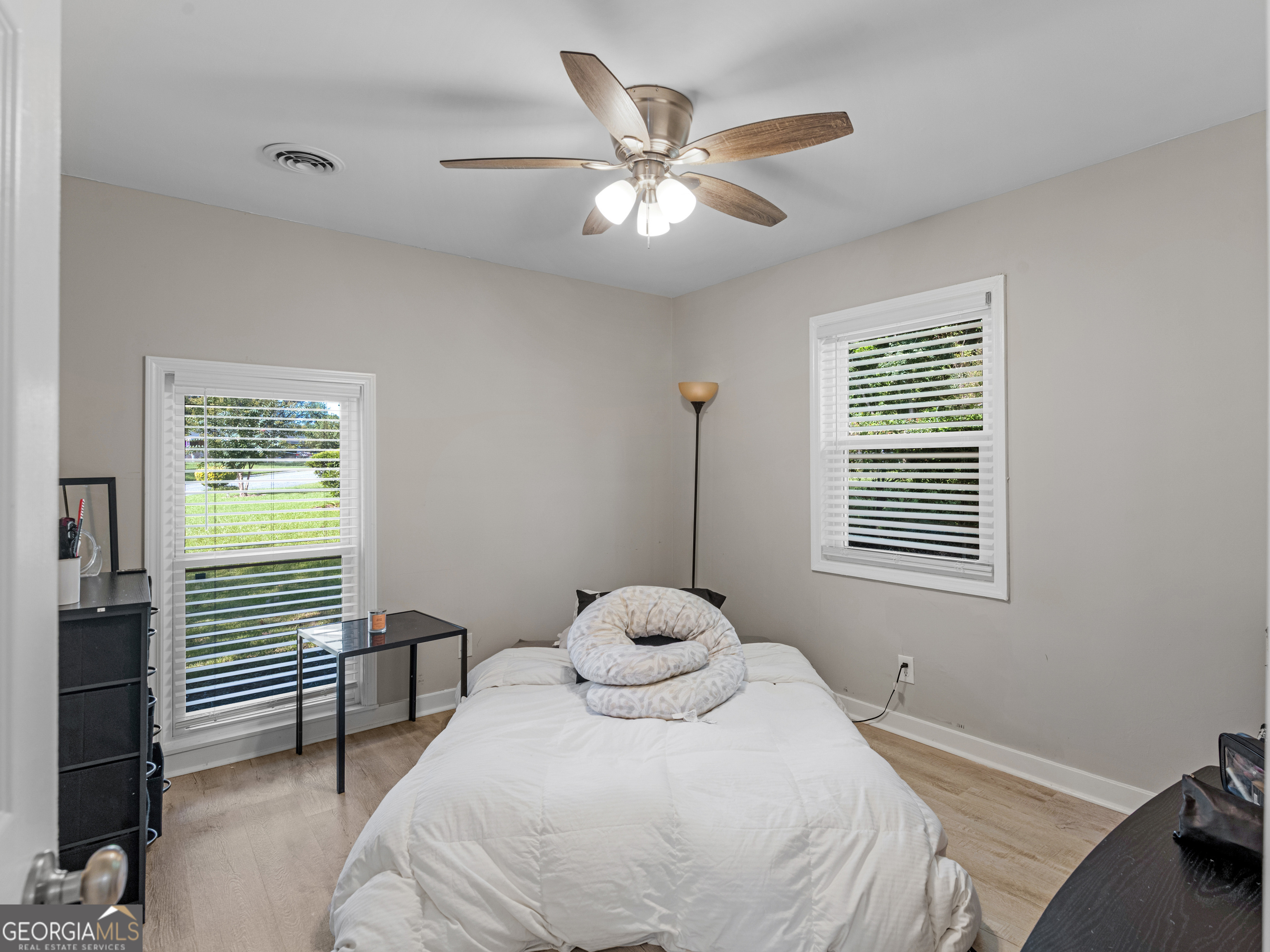 3445 Travis Boulevard Macon, GA 31206 - Photo 11 of 20 a bedroom with a bed and a window