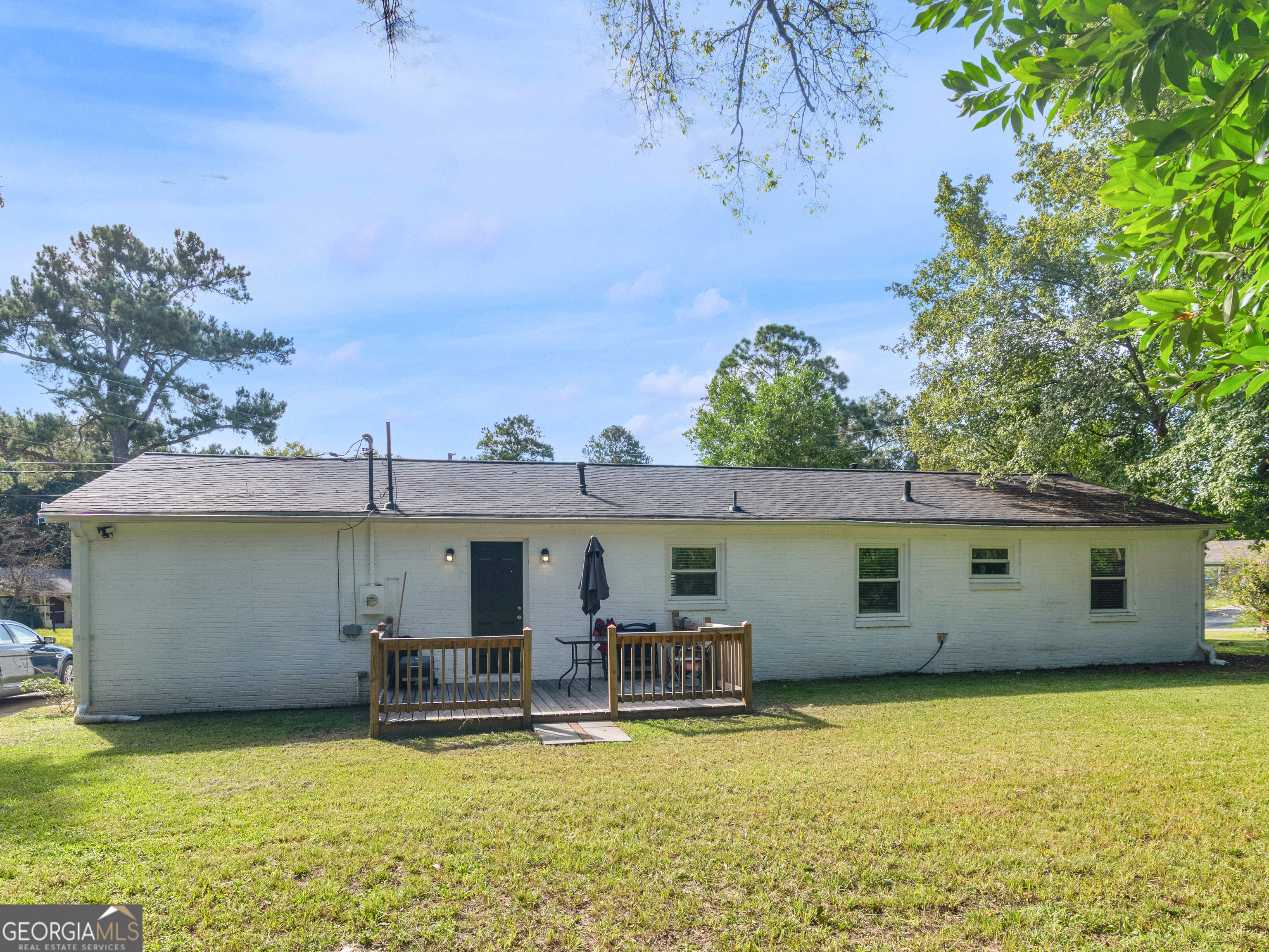 3445 Travis Boulevard Macon, GA 31206 - Photo 17 of 20 a view of a house with swimming pool in front of it