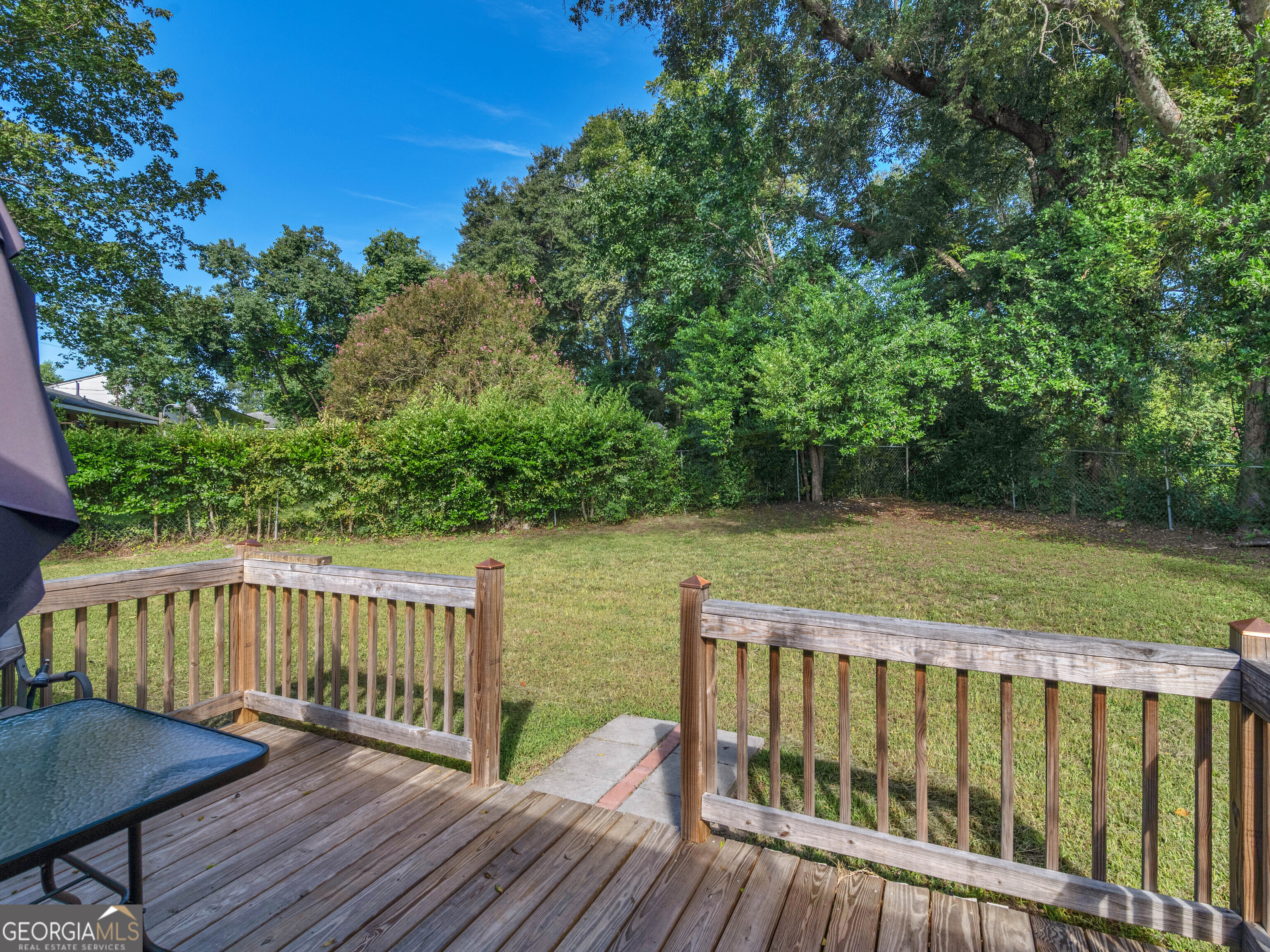 3445 Travis Boulevard Macon, GA 31206 - Photo 18 of 20 a view of balcony with wooden floor and outdoor seating