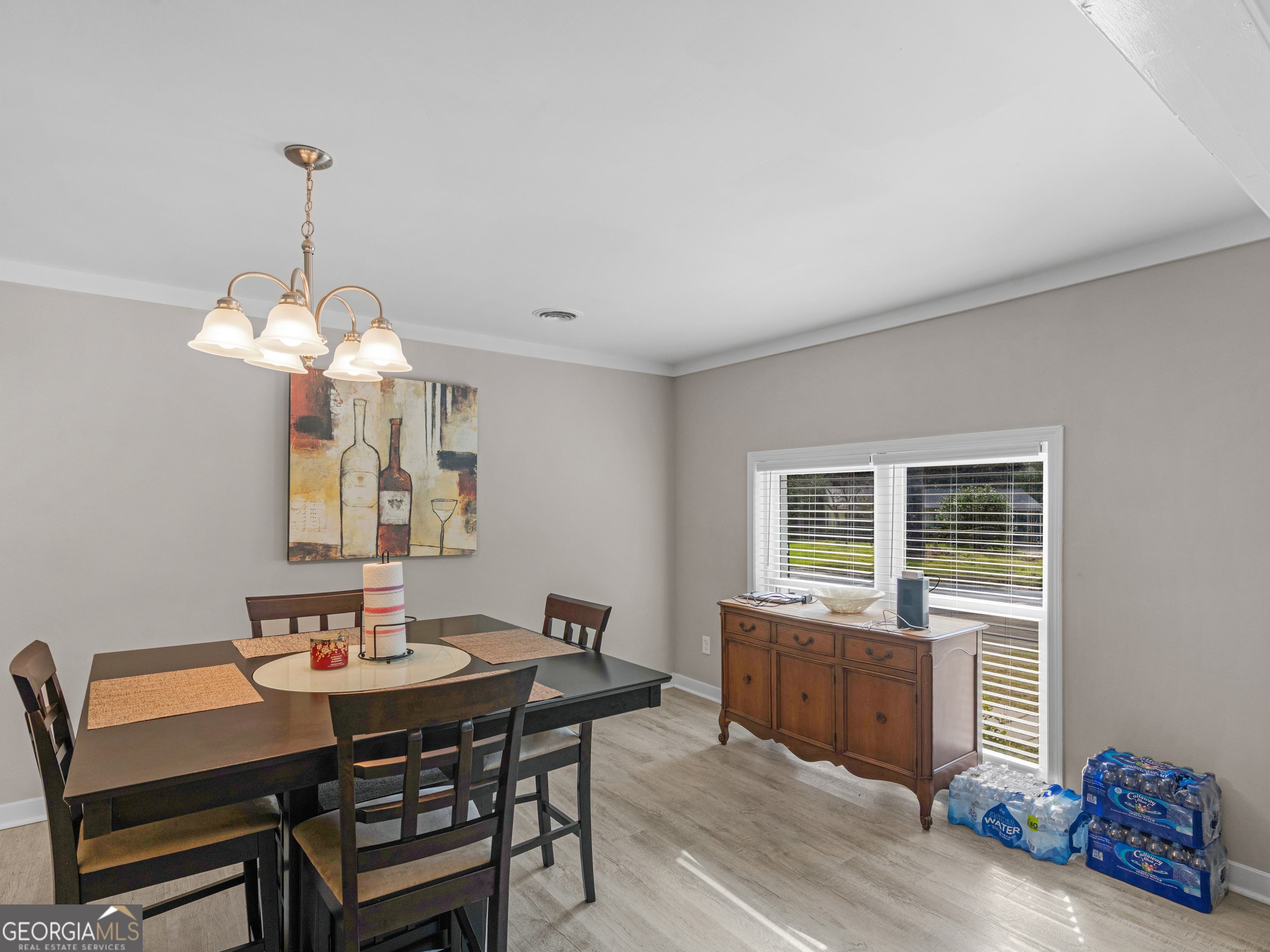 3445 Travis Boulevard Macon, GA 31206 - Photo 7 of 20 a view of a dining room with furniture window and wooden floor
