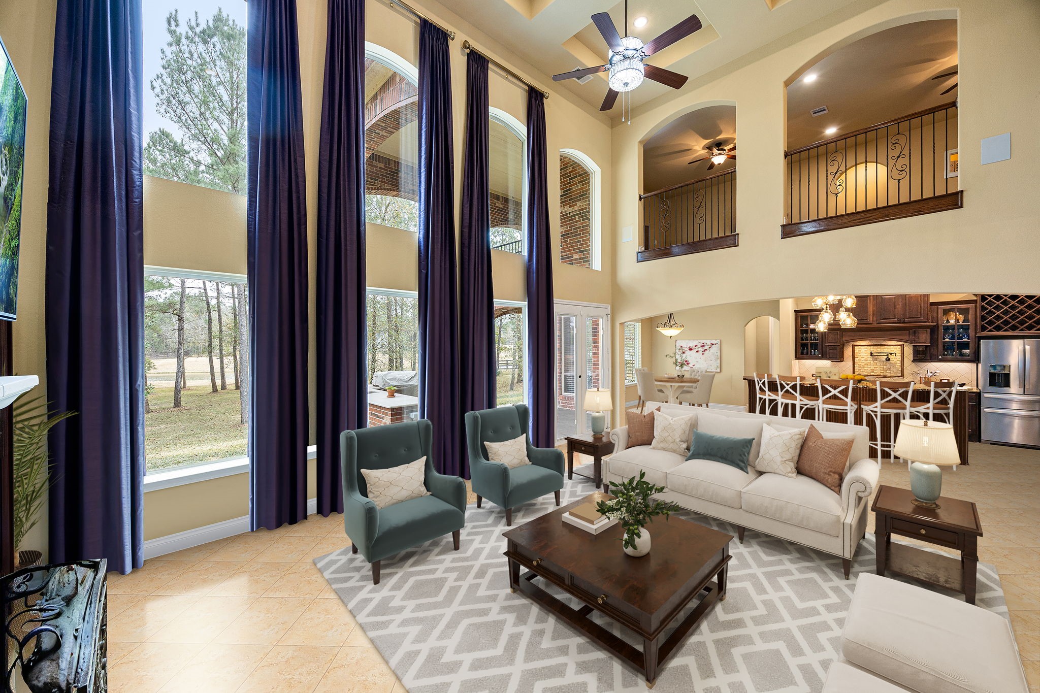 23421 Cannondale Loop Montgomery, TX 77316 - Photo 12 of 47 Grand and airy living space featuring dramatic floor-to-ceiling windows, abundant natural light, and an open-concept design that flows beautifully into the kitchen and dining areas. A perfect blend of elegance and warmth, ideal for relaxing or hosting unforgettable gatherings.