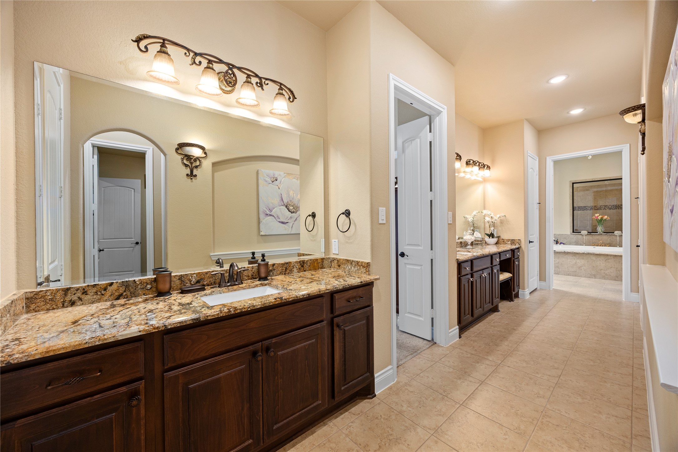 23421 Cannondale Loop Montgomery, TX 77316 - Photo 18 of 47 The primary on-suite bathroom features dual vanities
