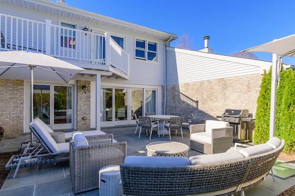 520 Hampton Road, Unit 18 Southampton, NY 11968 - Photo 15 of 20 a building outdoor space with patio furniture