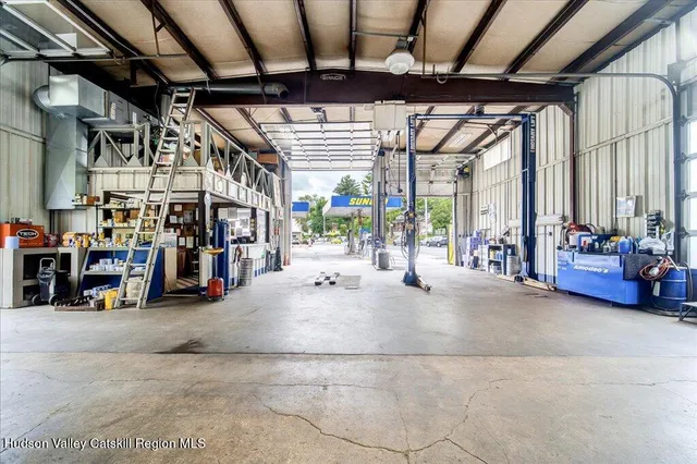 a view of a garage with gym equipment