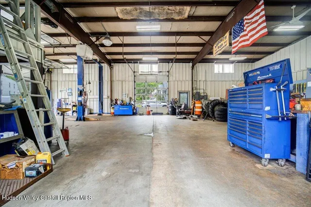 a view of the room with gym equipment