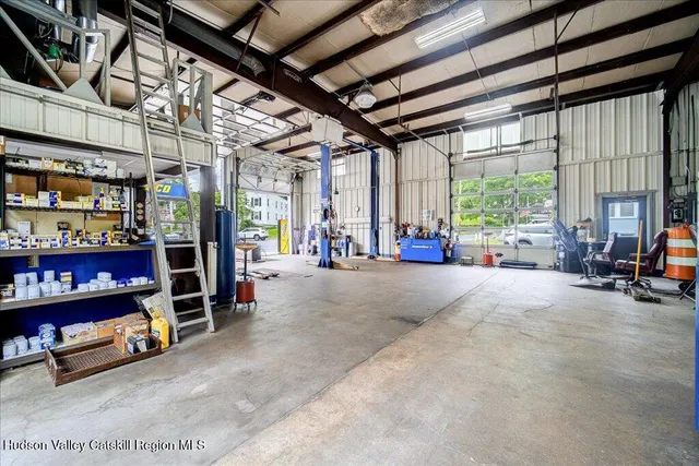 a view of a storage area with furniture