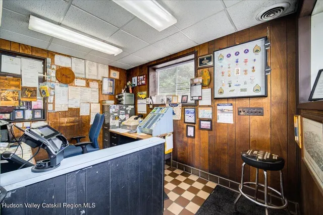a bathroom with a sink a toilet and a shower