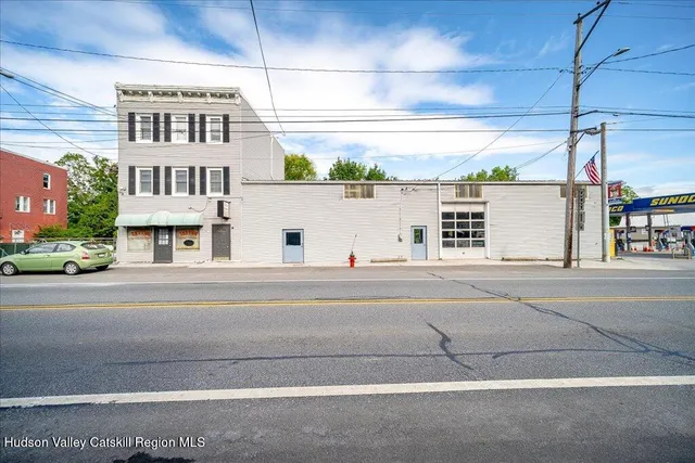 a view of a building and a street