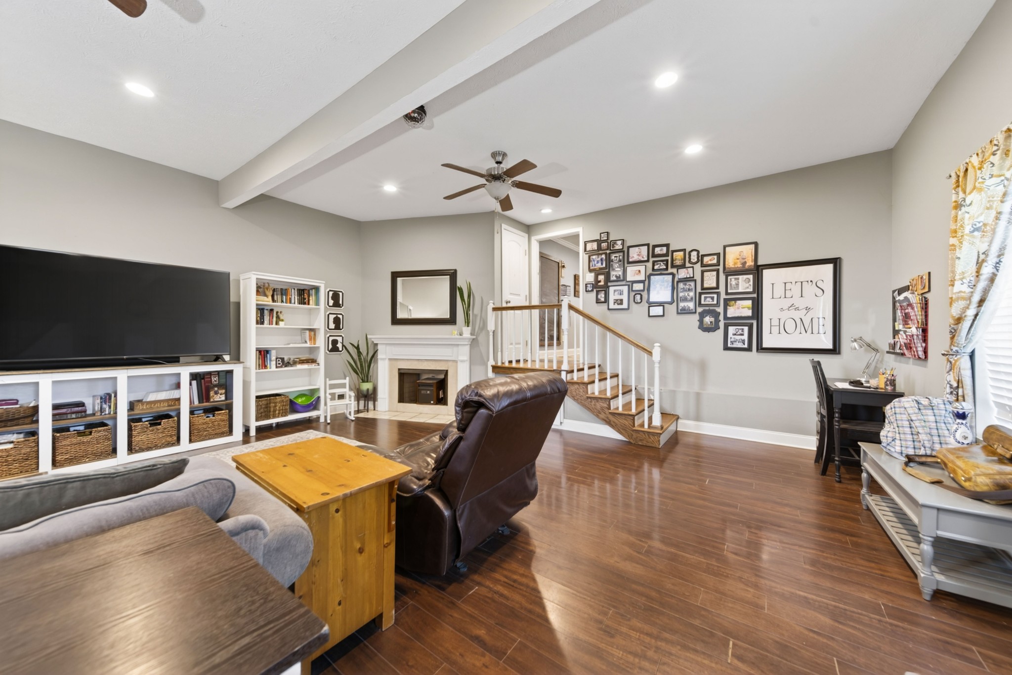 8023 Bethlehem Road Springfield, TN 37172 - Photo 53 of 55 a living room with furniture a flat screen tv and wooden floor
