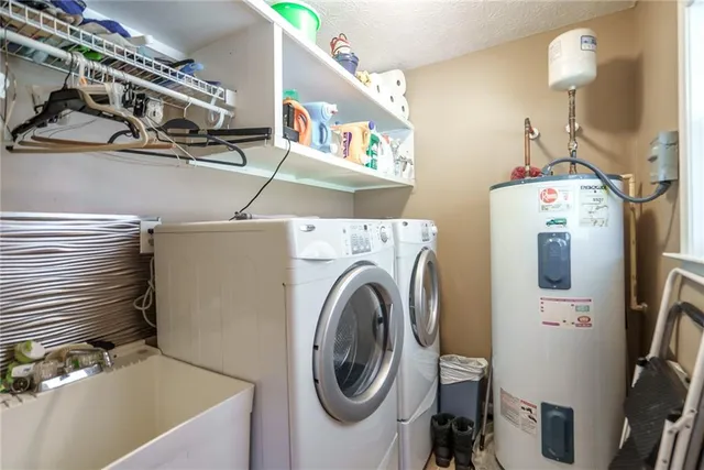 a living room with furniture ceiling fan and a window
