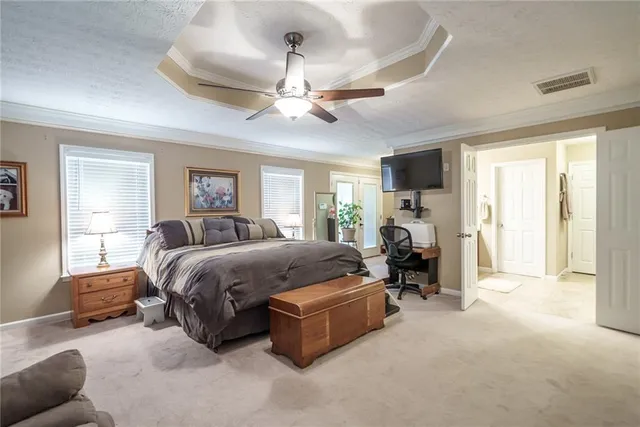 a spacious bathroom with a double vanity sink mirror and double