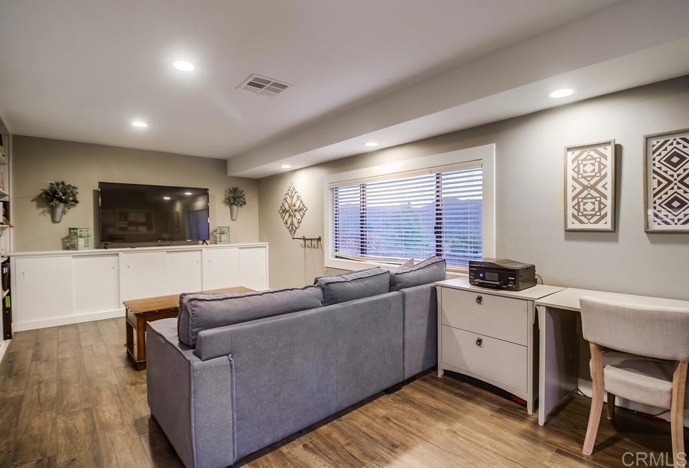 2444 Via Dieguenos Alpine, CA 91901 - Photo 19 of 69 a living room with furniture and a flat screen tv
