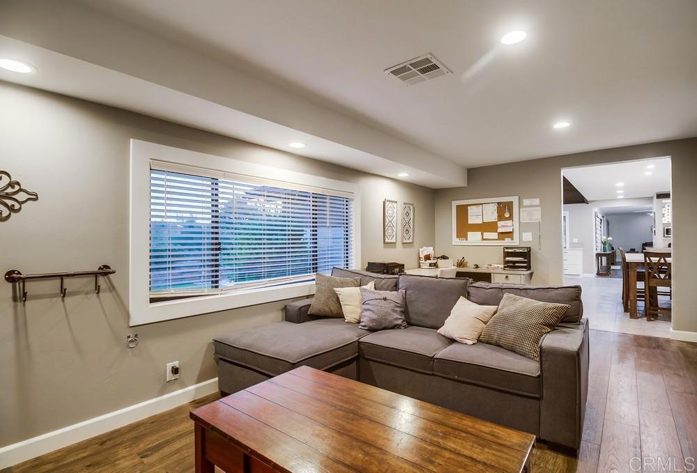 2444 Via Dieguenos Alpine, CA 91901 - Photo 23 of 69 a living room with furniture and wooden floor