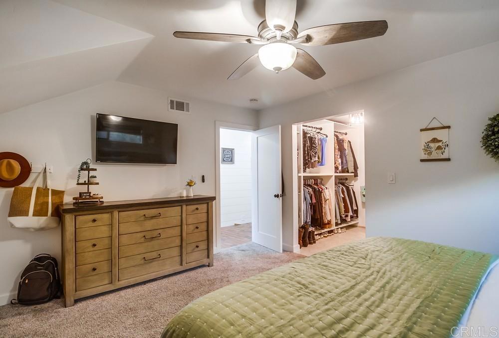 2444 Via Dieguenos Alpine, CA 91901 - Photo 27 of 69 a bedroom with a bed and a flat tv screen on the dresser