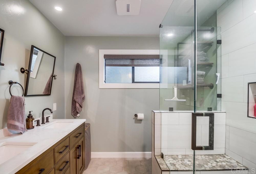 2444 Via Dieguenos Alpine, CA 91901 - Photo 29 of 69 a bathroom with a sink and a mirror