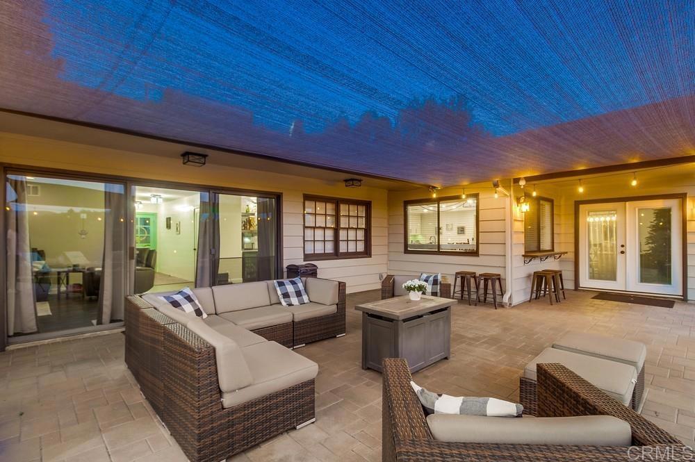 2444 Via Dieguenos Alpine, CA 91901 - Photo 38 of 69 a large room with furniture and large windows