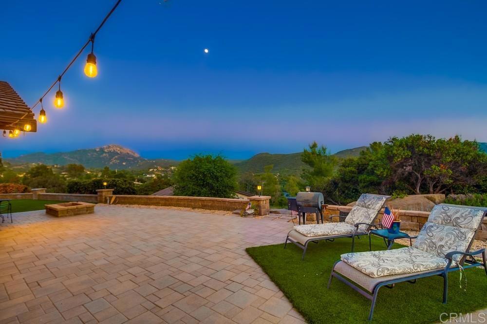 2444 Via Dieguenos Alpine, CA 91901 - Photo 40 of 69 a view of a patio with dining table and chairs with a swimming pool