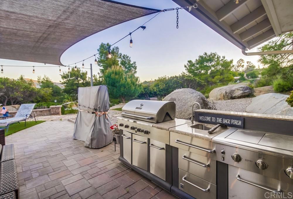2444 Via Dieguenos Alpine, CA 91901 - Photo 51 of 69 a view of a backyard with table and chairs