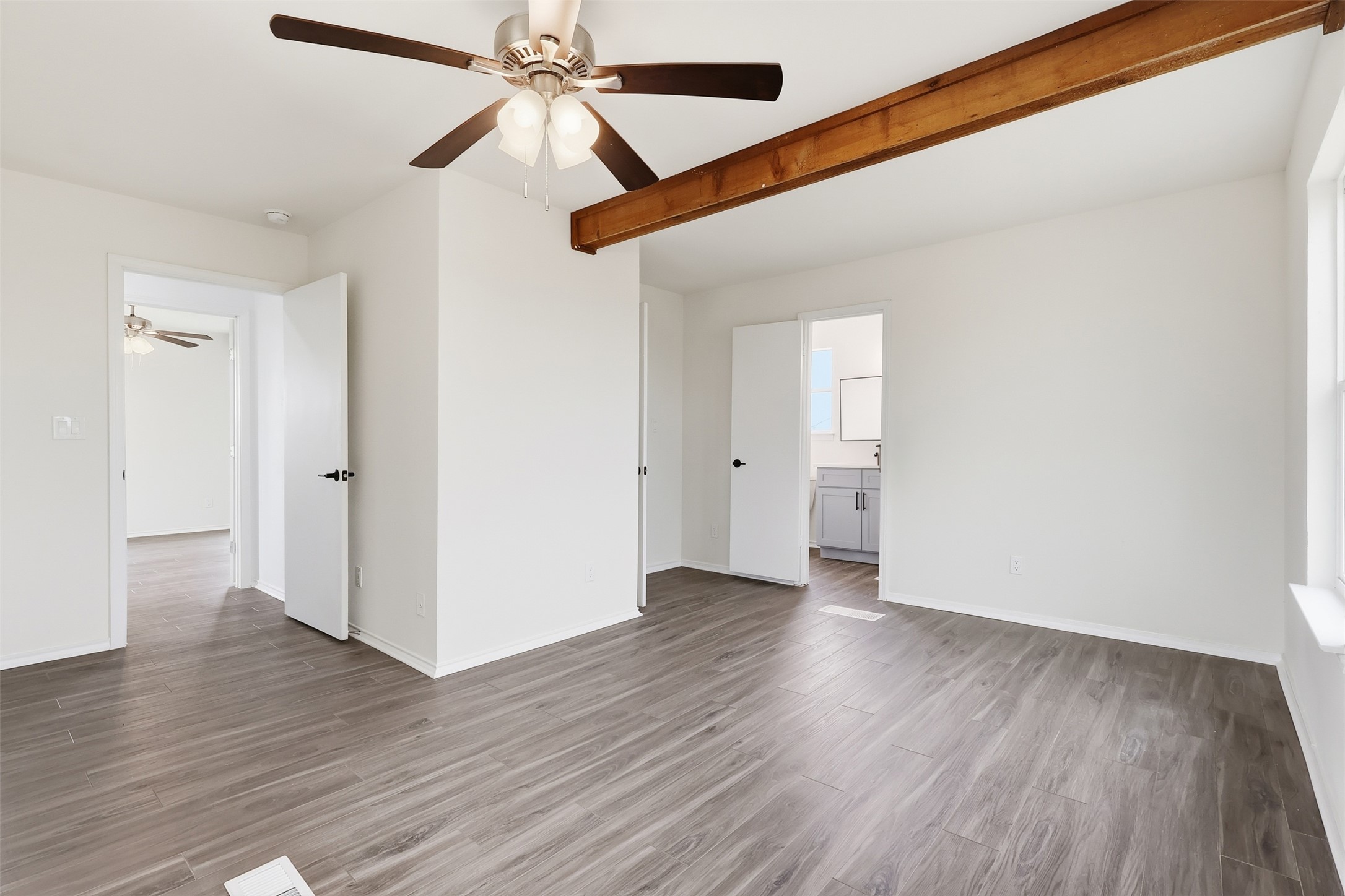 13201 Jacobson Road Manor, TX 78653 - Photo 18 of 25 a view of an empty room and wooden floor