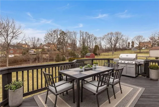 a view of a chairs and table on the terrace