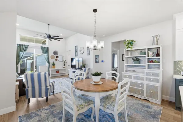 a view of a dining room with furniture