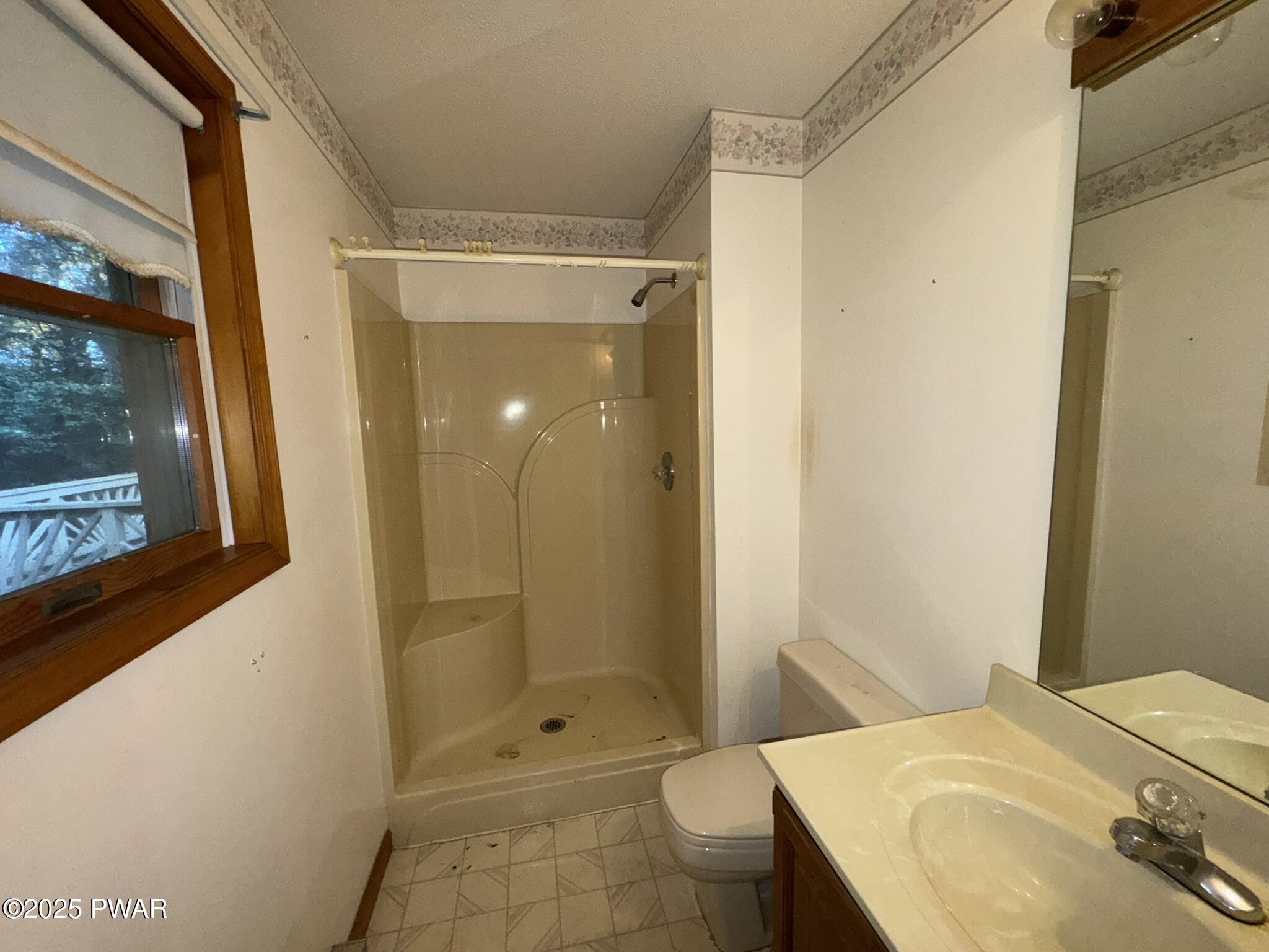 21 Tuthill Road Waymart, PA 18472 - Photo 13 of 49 a bathroom with a sink toilet and shower