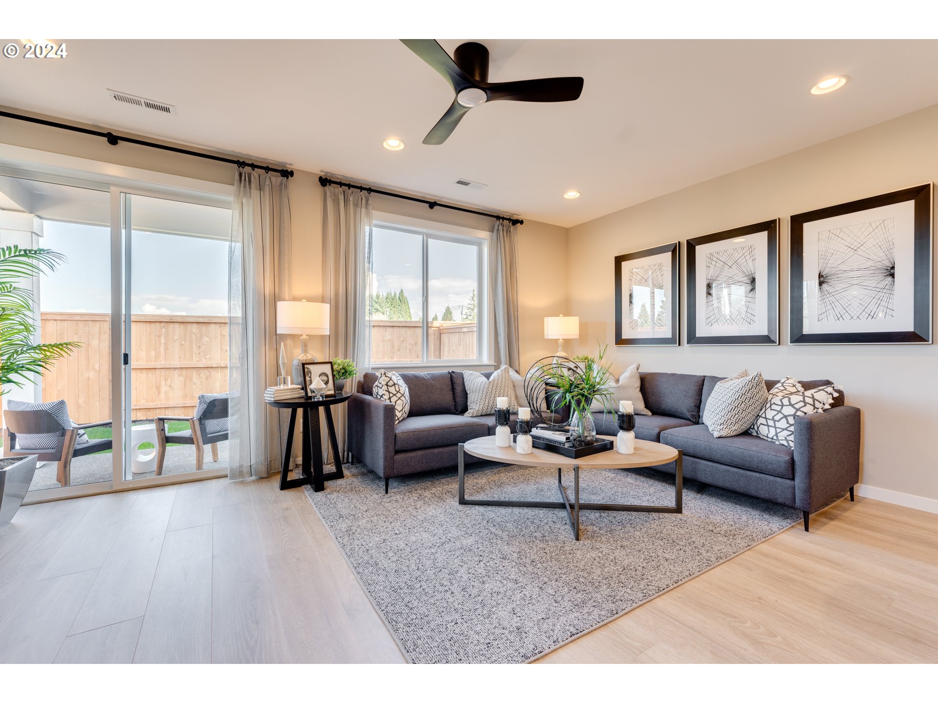 842 Northwest 178th Street Ridgefield, WA 98642 - Photo 11 of 46 a living room with furniture and a large window