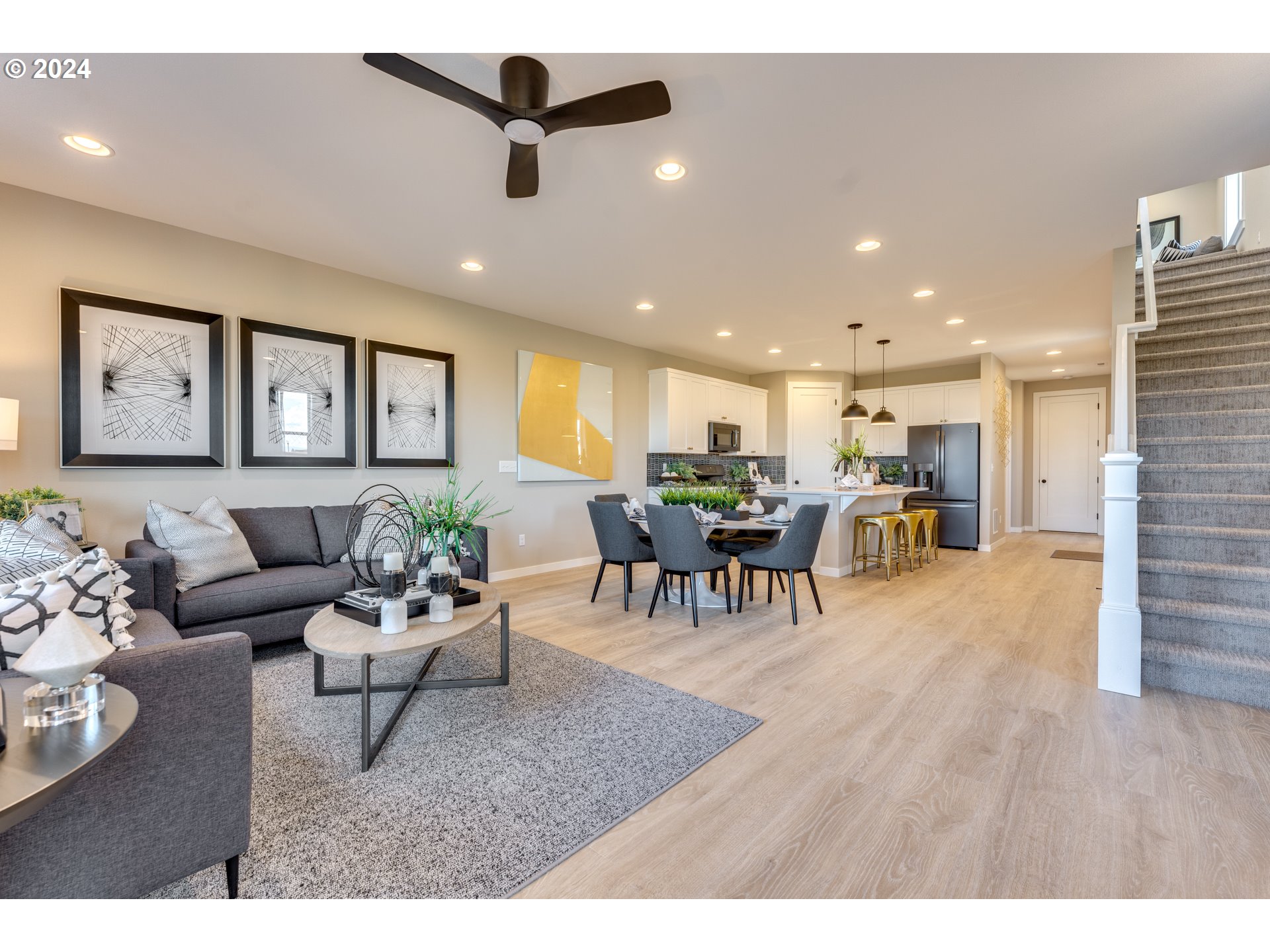 842 Northwest 178th Street Ridgefield, WA 98642 - Photo 14 of 46 a living room with furniture and kitchen view