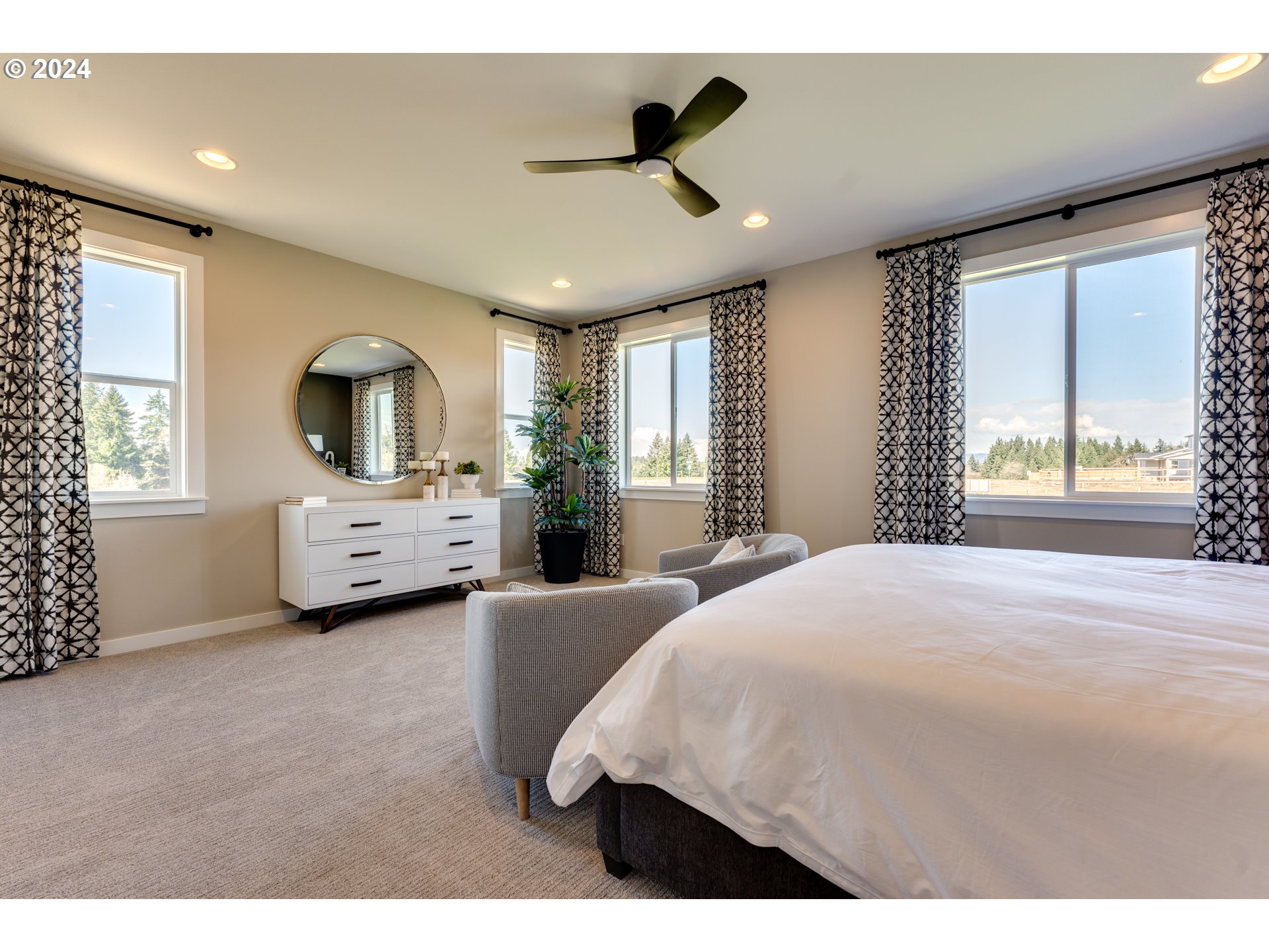 842 Northwest 178th Street Ridgefield, WA 98642 - Photo 23 of 46 a bedroom with a bed couch and window