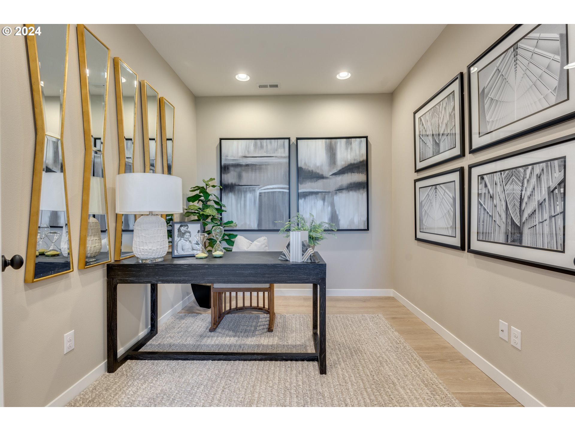 842 Northwest 178th Street Ridgefield, WA 98642 - Photo 24 of 46 a living room with furniture a painting on the wall and a potted plant