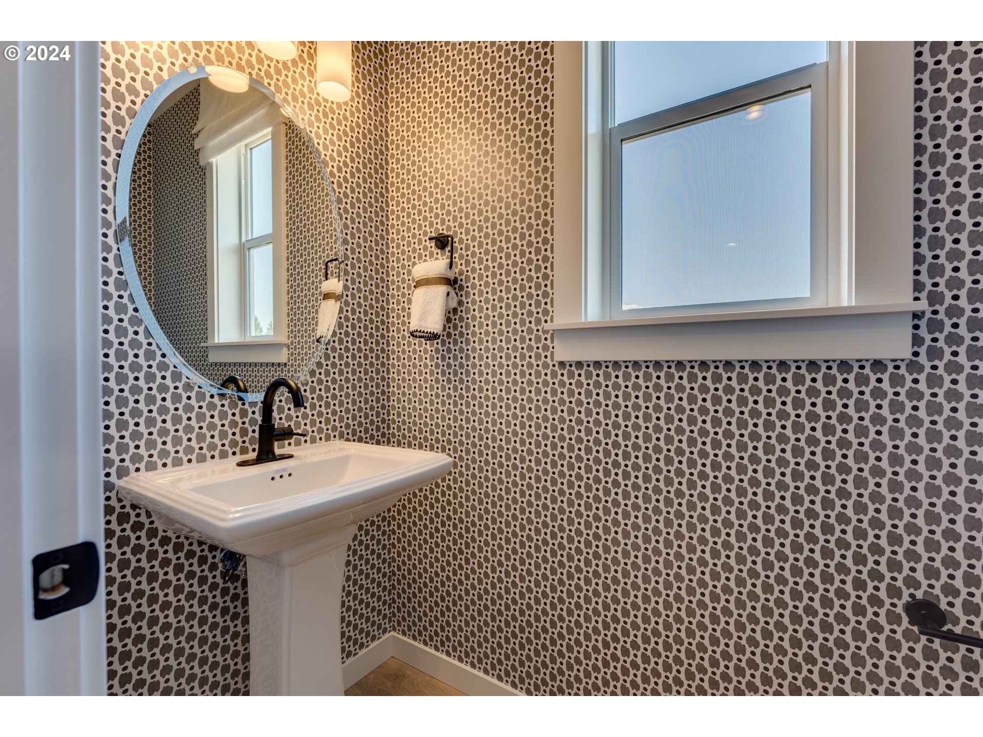 842 Northwest 178th Street Ridgefield, WA 98642 - Photo 31 of 46 a bathroom with a sink mirror and vanity