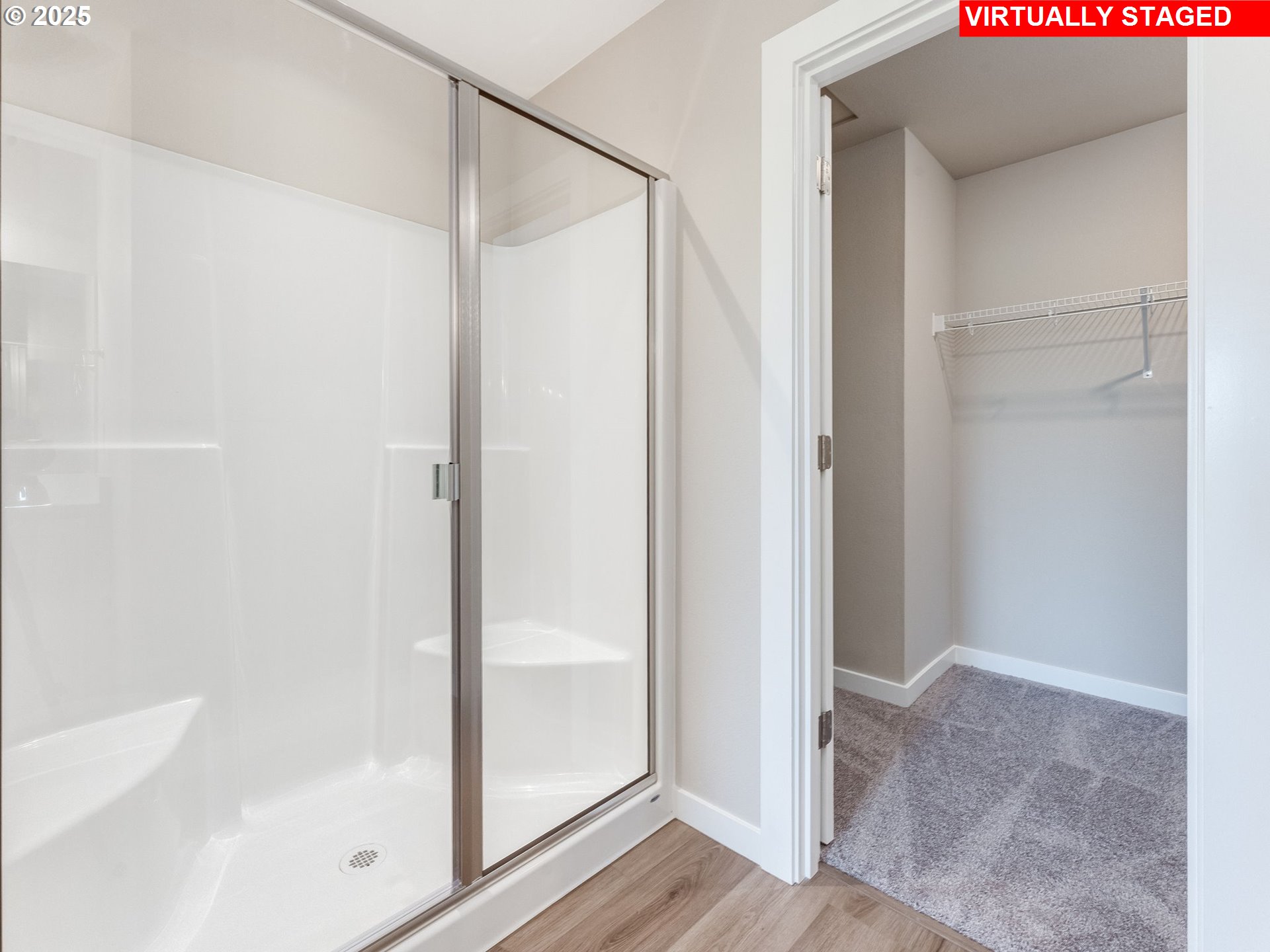 842 Northwest 178th Street Ridgefield, WA 98642 - Photo 39 of 46 a bathroom with a glass shower door