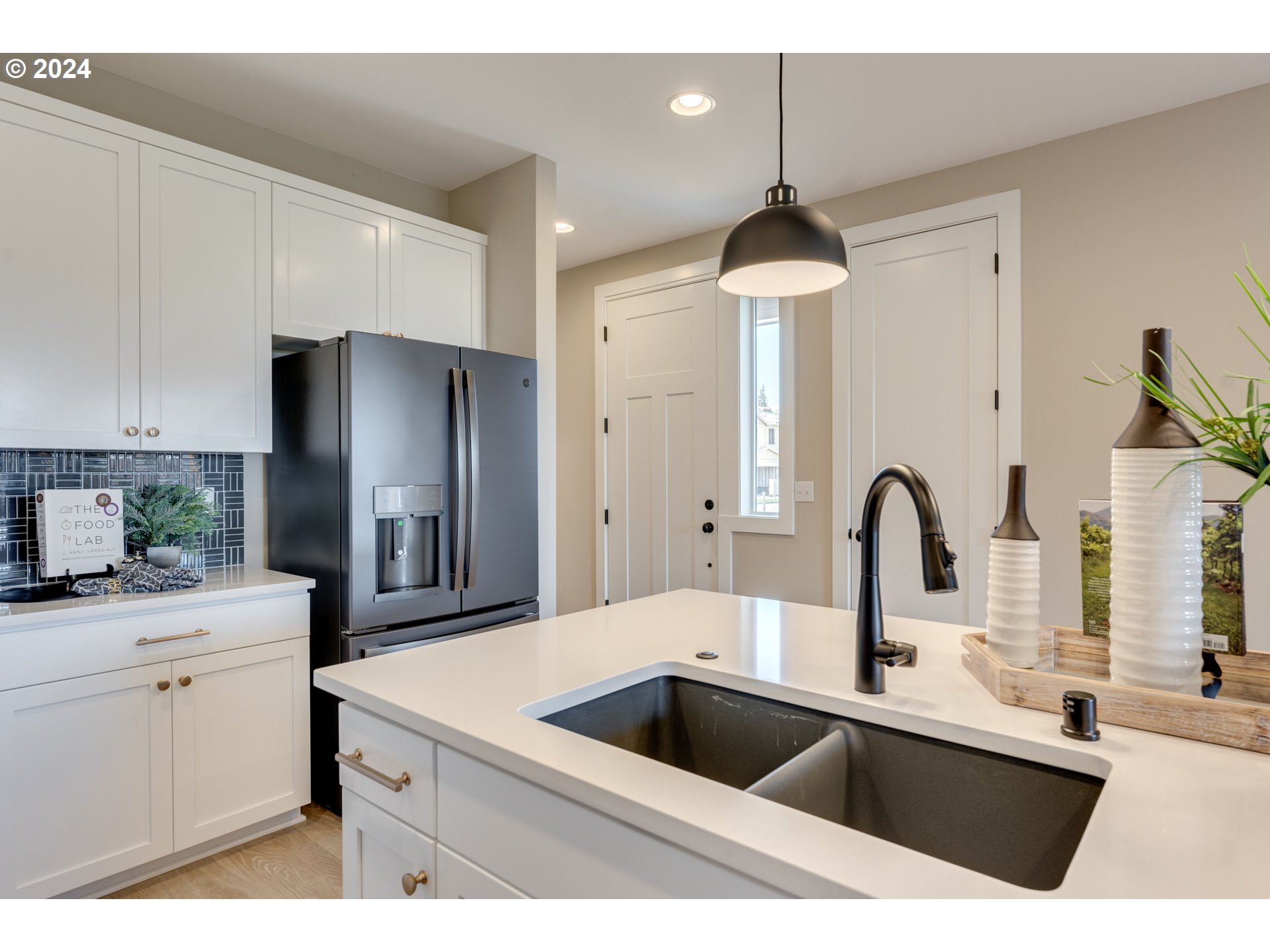 842 Northwest 178th Street Ridgefield, WA 98642 - Photo 4 of 46 a kitchen with a sink cabinets and stainless steel appliances