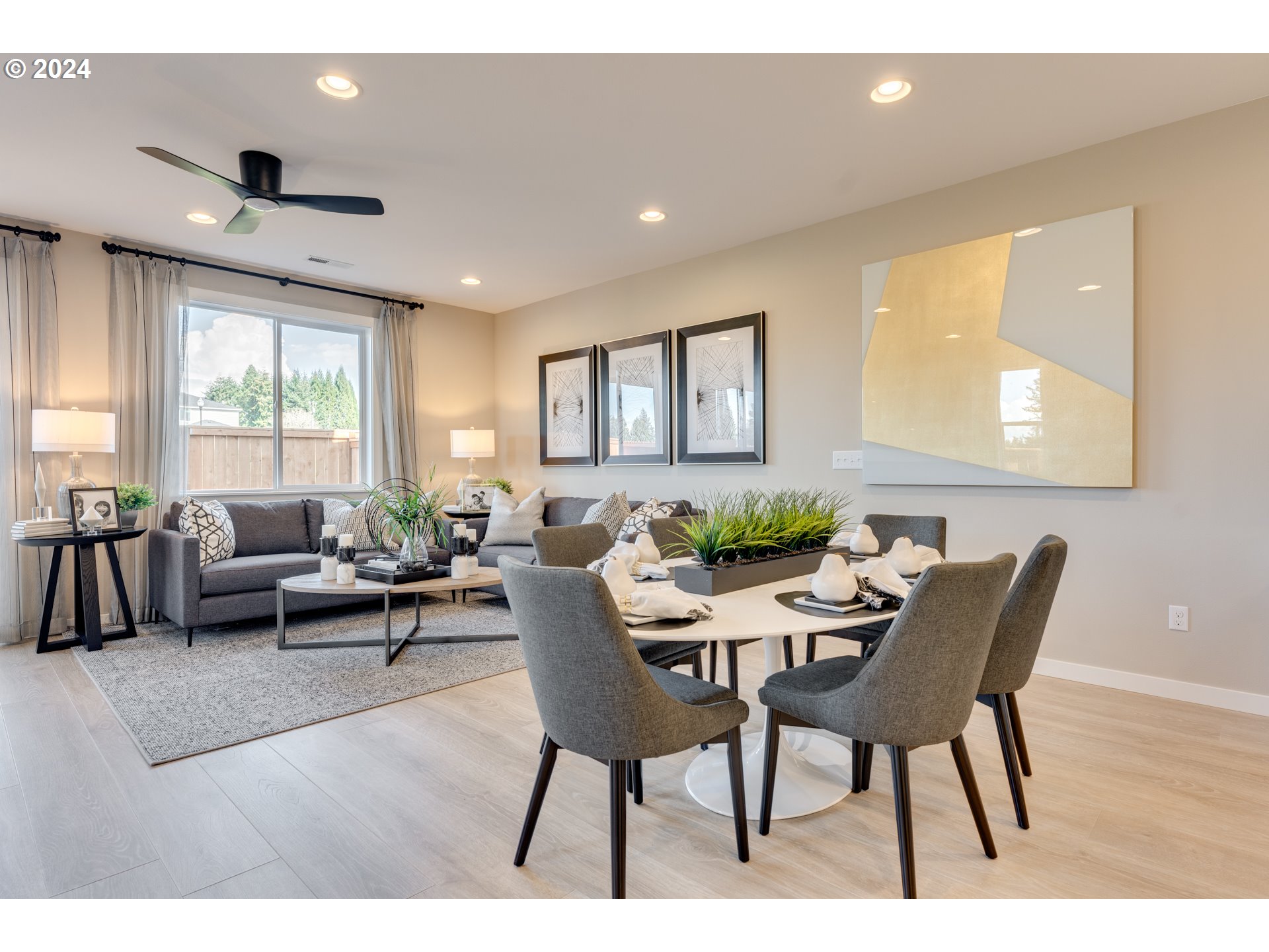 842 Northwest 178th Street Ridgefield, WA 98642 - Photo 6 of 46 a living room with furniture and a large window