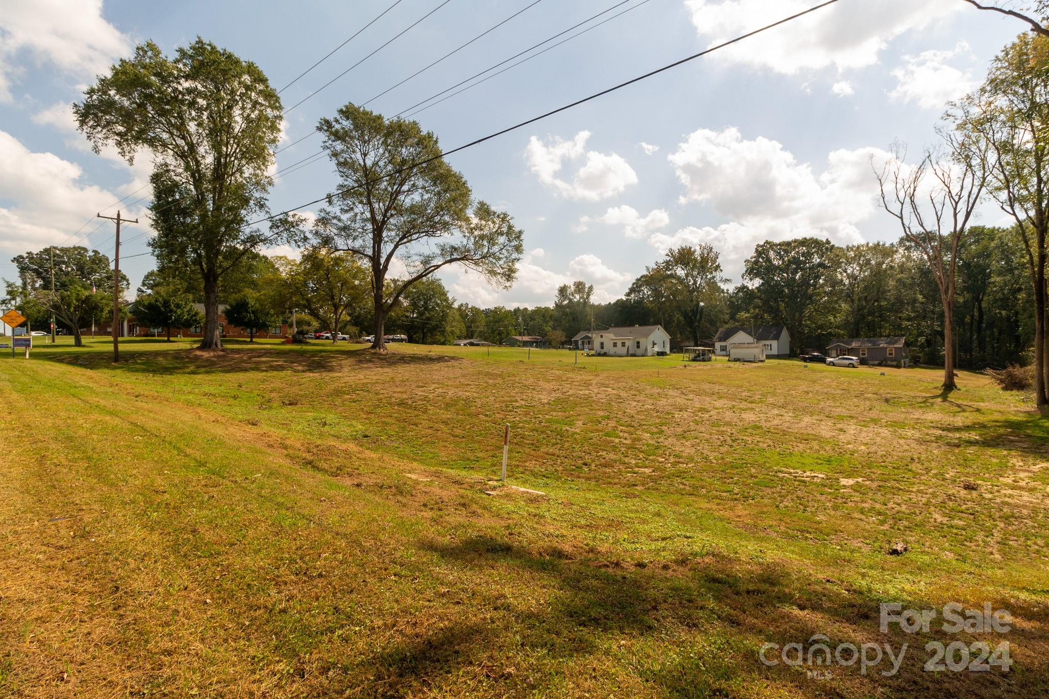 1301 Shelby Road Kings Mountain, NC 28086 - Photo 14 of 15 a view of a swimming pool with an outdoor space and seating area