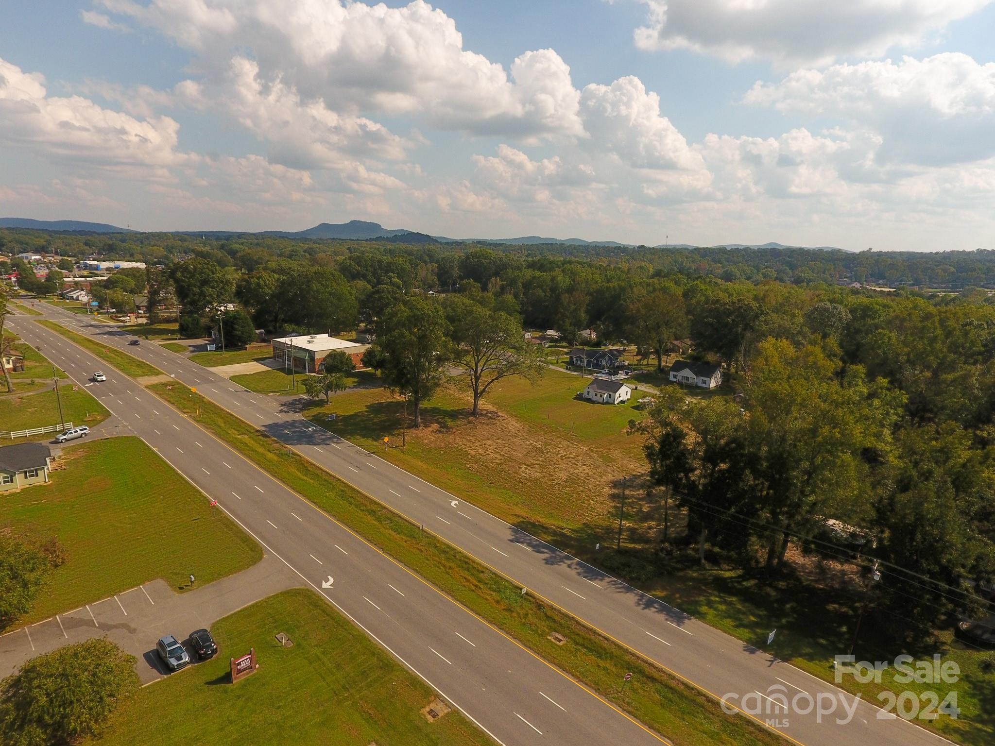 1301 Shelby Road Kings Mountain, NC 28086 - Photo 8 of 15 a view of a lake with houses
