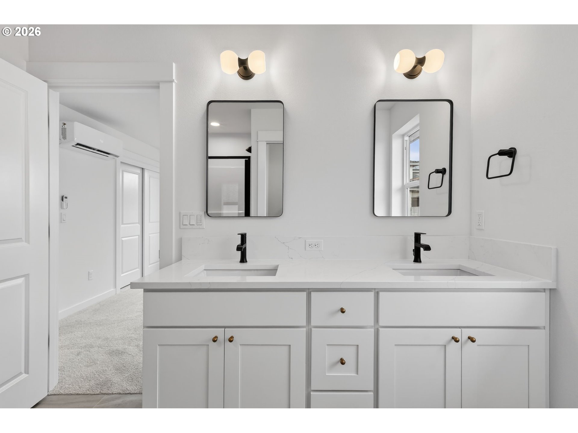 4055 Southwest McKinley Street, Unit 39 Gresham, OR 97080 - Photo 22 of 35 a bathroom with double vanity sinks and a mirror